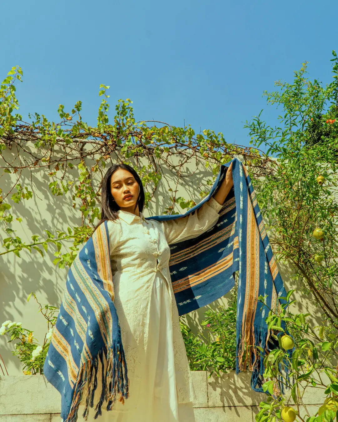 Woman wearing artisan ikat from Flores, Indonesia